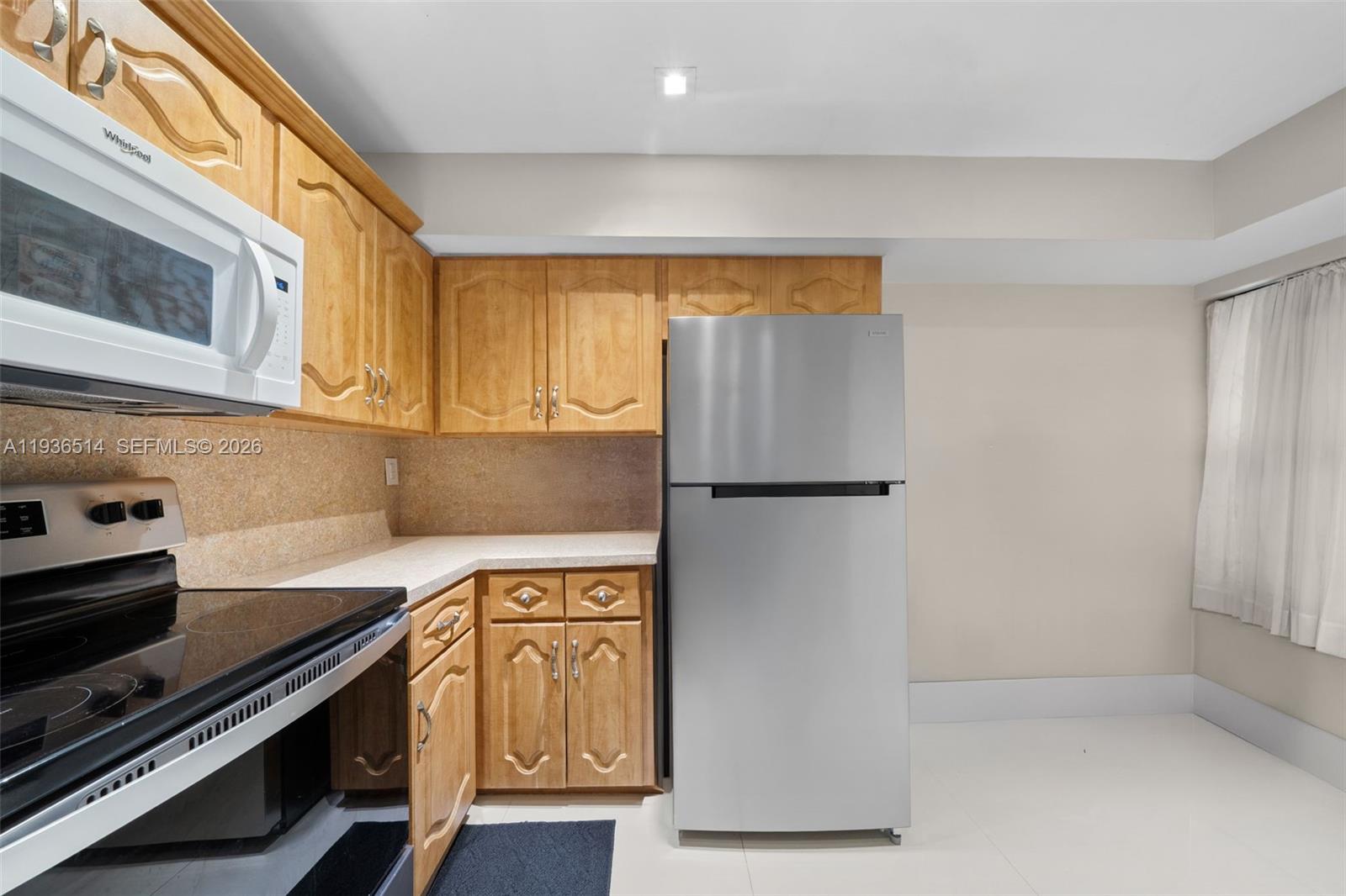 QUATRAINE CONDO IV - Residential