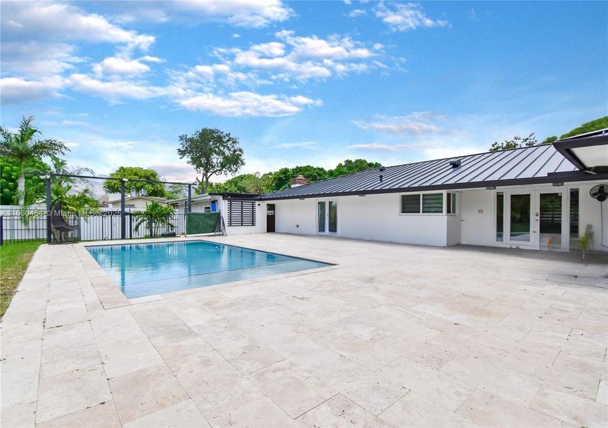 Fully updated, and privately nestled on 1/2 acre in Southwest Ranches. Located on a quiet cul-de-sac. This modern home features 5 en-suite bedrooms, an office, 5.5 bathrooms, beautiful marble flooring throughout, a new metal roof, impact windows & doors. All bedrooms have individual ductless mini-split AC units and impact doors. The office has its own private full bathroom that can be used as a second primary bedroom or media room, and has access to the pool. Outside the backyard features a new saltwater pool (2022), pergola, and a summer kitchen, perfect for entertaining. NO HOA! Enjoy peaceful living in one of Southwest Ranches’ most desirable locations. Available for sale! Schedule your showing today!