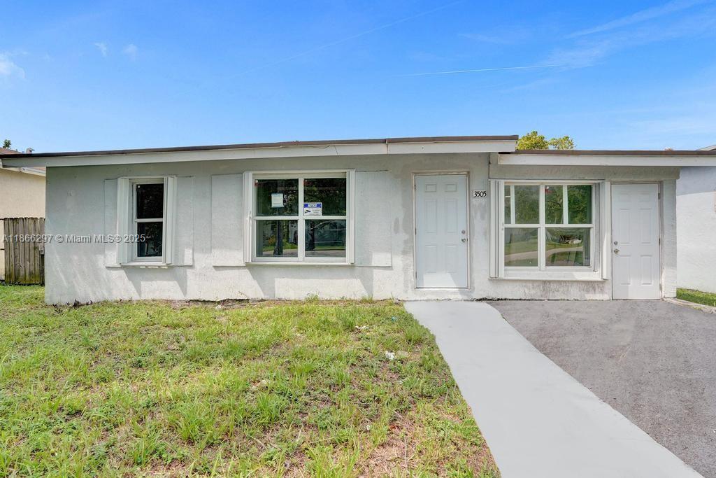 Welcome to this charming newly renovated 3 bedroom, 2bathroom home in Ft Lauderdale. You’ll appreciate the freshly painted interior, laminated wood floors throughout, central AC for year-round comfort, upgraded stainless steel kitchen appliances, new washer and dryer, and a spacious primary bedroom with a walk-in closet. Accordion shutters throughout the protect during storm The property offers a private yard with plenty of outdoor space Conveniently located near major highways, shopping, schools, and everything Fort Lauderdale has to offer.