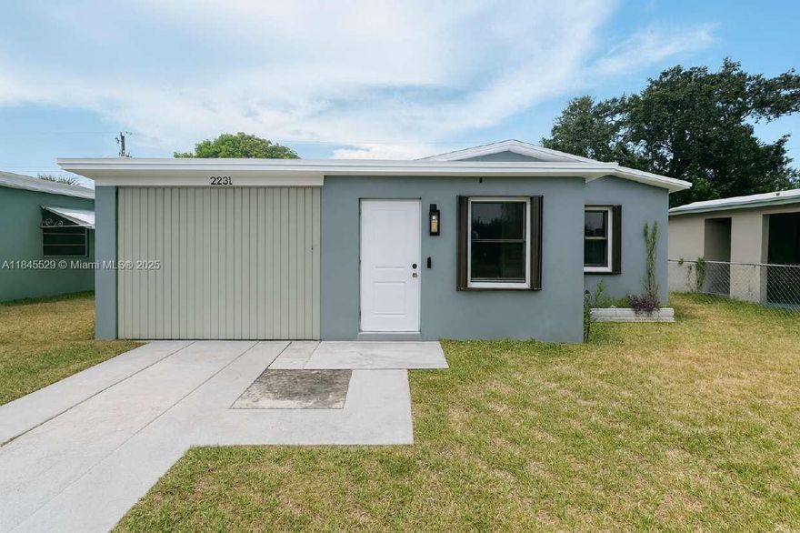 Beautifully Renovated 3-Bedroom Concrete Block Home in Fort Lauderdale – New Roof, No HOA!

New roof (2024), tile flooring throughout, and over $40,000 in upgrades! Open-concept kitchen with black shaker cabinets, stainless steel range/oven, and new countertops.

Bathroom includes a glass shower panel, a bathtub, a privacy window for natural light, shelving & towel hub. Highlights include central A/C, New water heater (2022), hurricane shutters, and an innovative entry/alarm system with fingerprint access.

Outside, enclosed carport can be used for storage or as a potential 4th extra room. Private driveway and additional gravel front parking fit several cars or vehicles, fenced backyard is perfect for entertaining.

Enclosed carport with side entrance, potential efficiency unit.