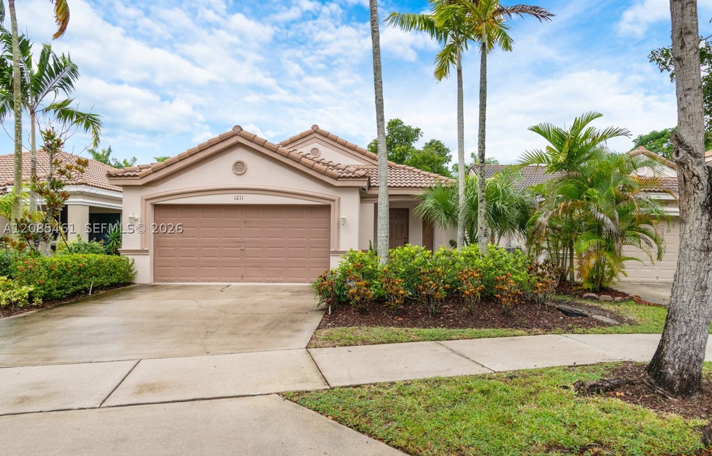 Photo of 1211 Golden Cane Dr, Weston, FL 33327 (MLS # A12085461)