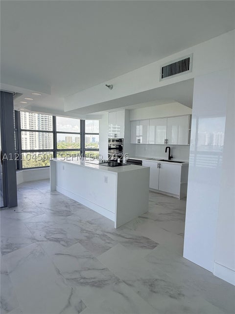 Photo of 19101 NE 36th Ct #1005, Aventura, FL 33180 (MLS # A12104501)