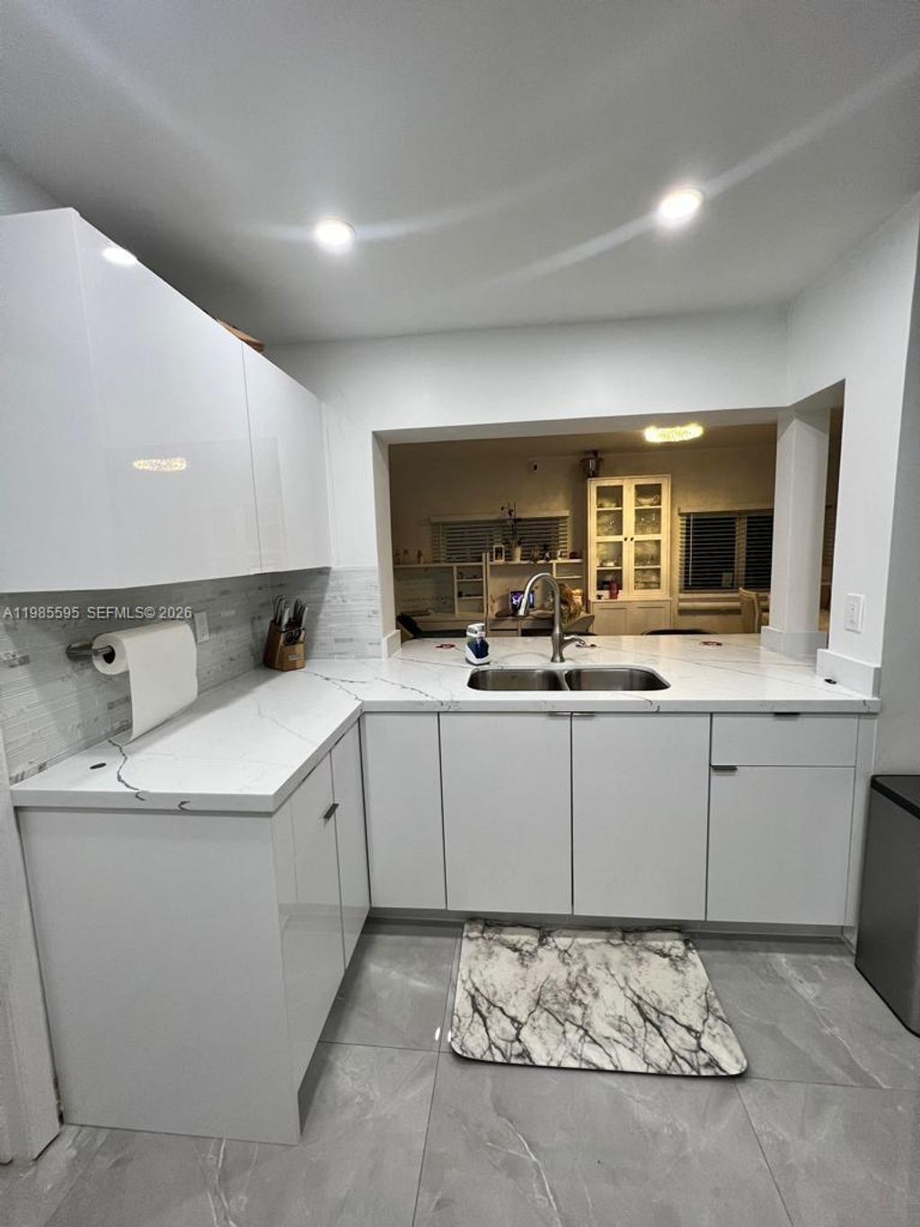 Photo of 7303 NW 57th Dr, Tamarac, FL 33321 (MLS # A11985595)