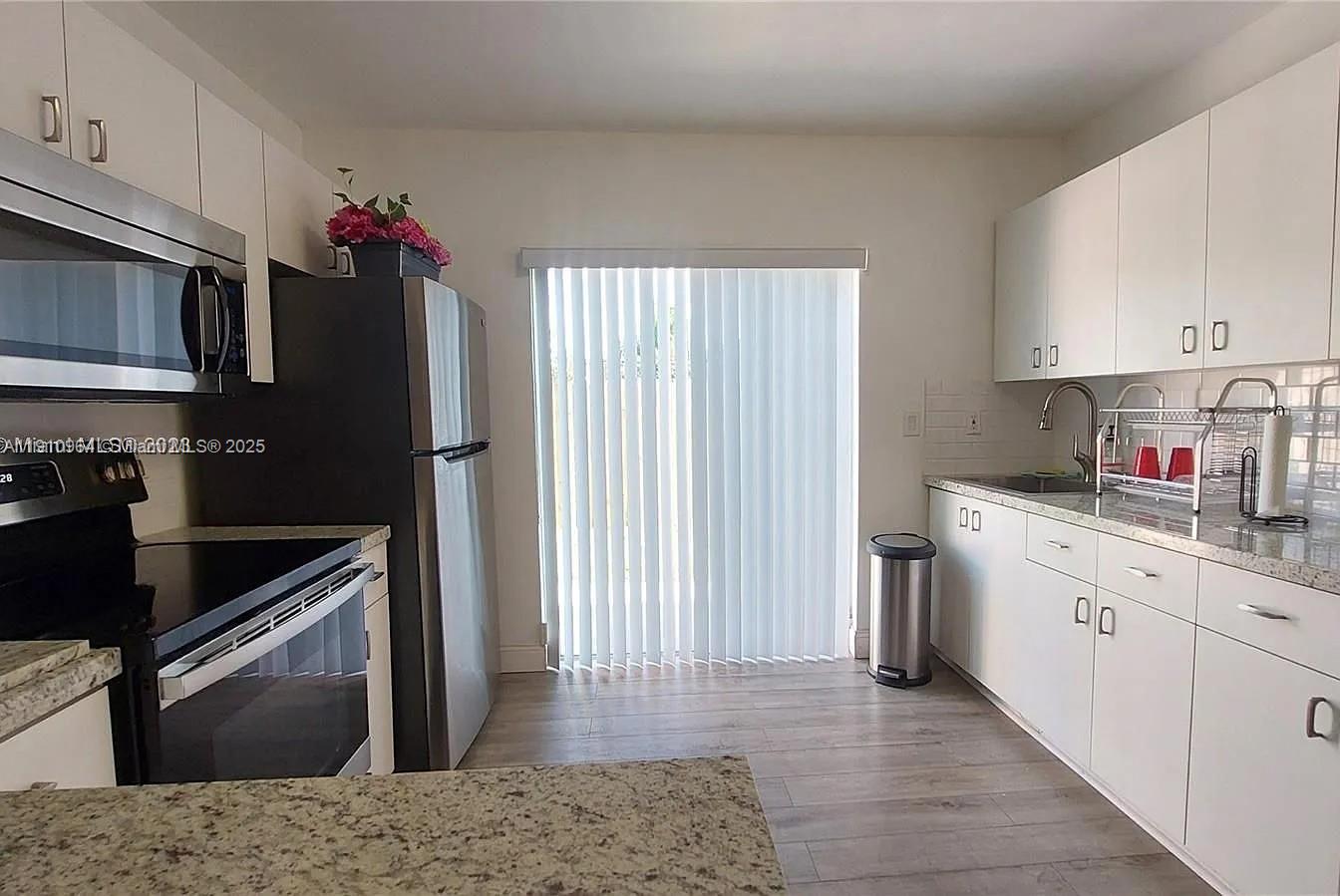 DORAL COURT CONDO - Residential Lease