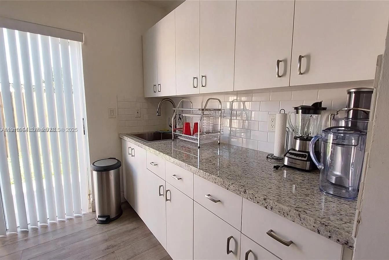 DORAL COURT CONDO - Residential Lease