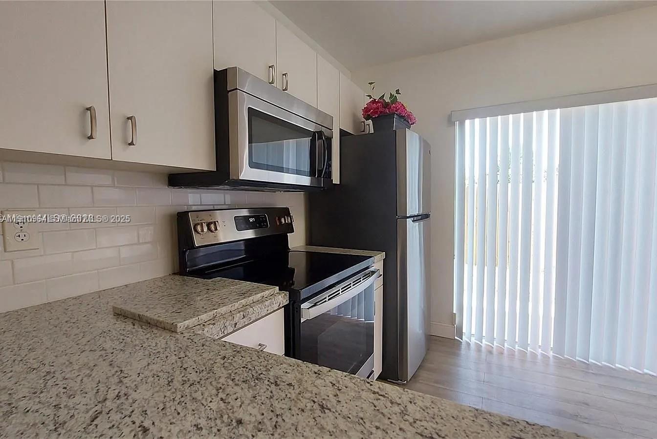 DORAL COURT CONDO - Residential Lease