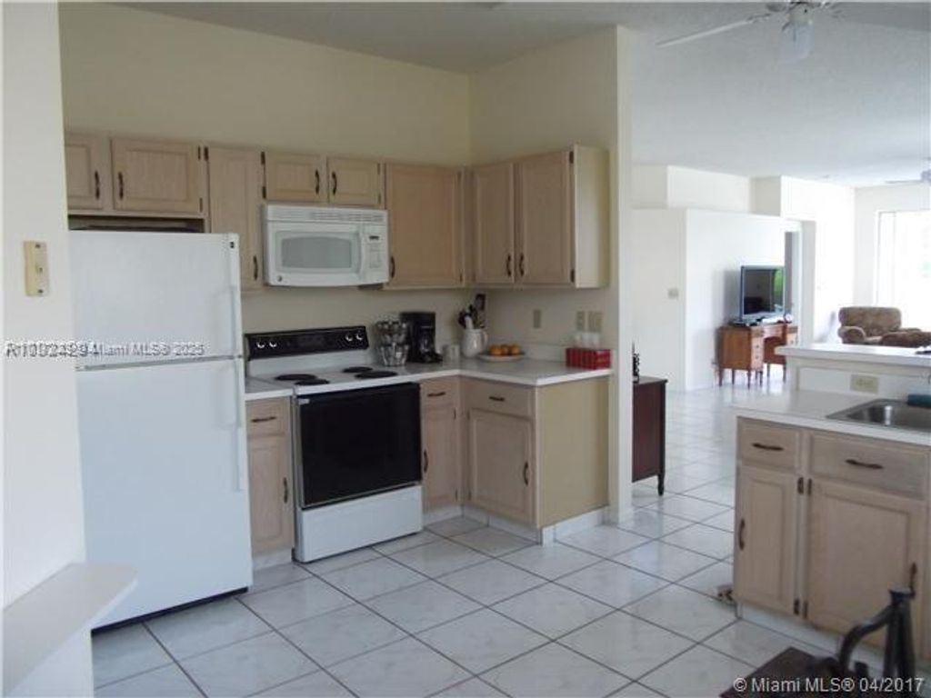 Photo of 142 Harbor Lake Circle, Green Acres, FL 33413 (MLS # A11717029)