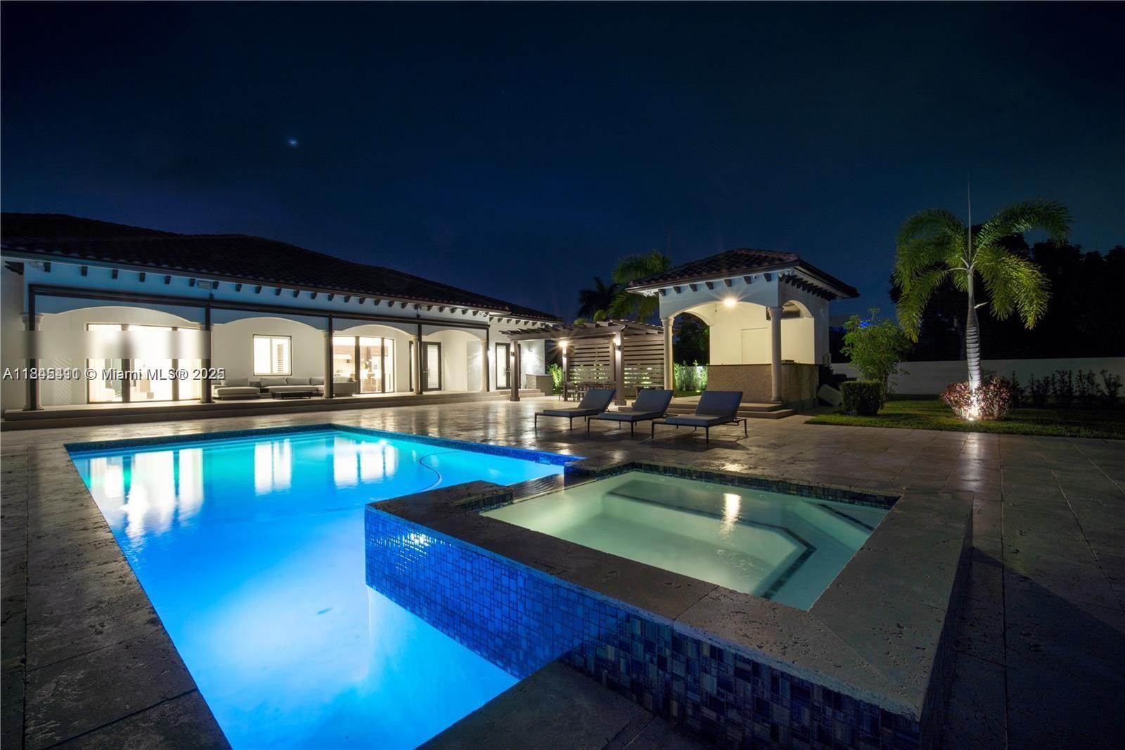 Discover the perfect blend of luxury, privacy, and meticulous craftsmanship in this 6 bed, 6 bath, 38,000 + dqf lot size home. Over 5,000 sq. ft. of elegant travertine pavers expand the driveway and seamlessly connect to a beautifully designed backyard. Lush Podocarpus hedges span 300+ linear feet along the property line, ensuring total privacy, while more than 100 custom landscape lights illuminate the exterior with warmth and sophistication. Step inside to find upgraded designer light fixtures throughout, a fully air-conditioned and remodeled garage, and dramatic new front doors that set the tone for the entire home. The concrete perimeter wall has been freshly painted, and both the interior and exterior boast a crisp, modern finish. Right next to top private school Belen Jusuit.