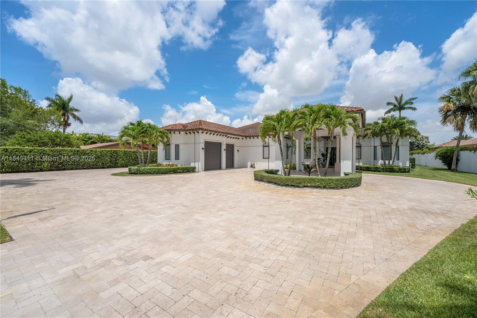 Discover the perfect blend of luxury, privacy, and meticulous craftsmanship in this 6 bed, 6 bath, 38,000 + dqf lot size home. Over 5,000 sq. ft. of elegant travertine pavers expand the driveway and seamlessly connect to a beautifully designed backyard. Lush Podocarpus hedges span 300+ linear feet along the property line, ensuring total privacy, while more than 100 custom landscape lights illuminate the exterior with warmth and sophistication. Step inside to find upgraded designer light fixtures throughout, a fully air-conditioned and remodeled garage, and dramatic new front doors that set the tone for the entire home. The concrete perimeter wall has been freshly painted, and both the interior and exterior boast a crisp, modern finish. Right next to top private school Belen Jusuit.