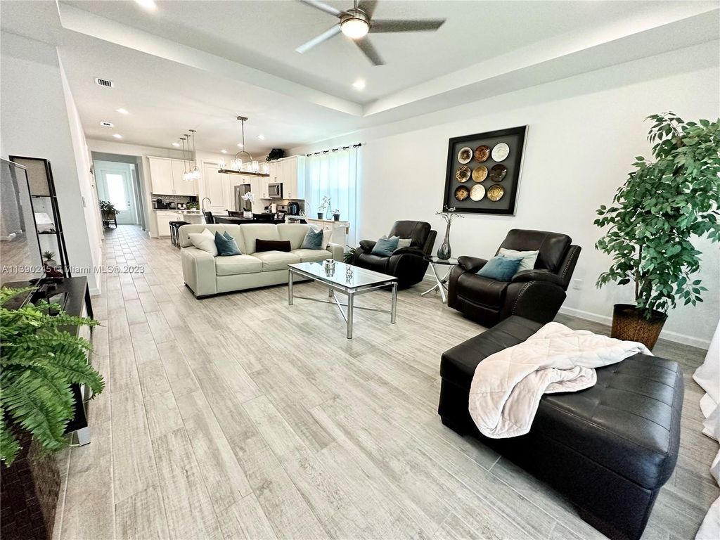 Photo of 11340 SW Lyra Dr, Port Saint Lucie, FL 34987 (MLS # A11390245)