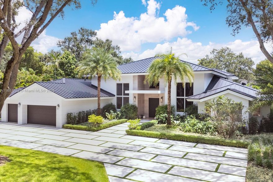 Gorgeous, luxurious, and immaculate prime north central Pinecrest gated oak-laden acre estate on fabulous low traffic hidden street. Complete customized renovation-expansion in 2023 by Kenner Homes: metal roof, new entryway, custom garage doors, full-house generator, and dream-like backyard! The ultimate rarely found top-of-the-line finishes: special Arabescaro Corchia marble, Calacatta Viola marble, Philip Jeffries suede wallpaper, French Oak wood floors, Ann Saks terrazzo, Stark carpet, and much more. Pool/patio area includes new gazebo fully equipped with outdoor kitchen and high-end pizza oven, expansive yard has a combined basketball and pickleball court along with an in-ground trampoline! If only the best will do for you and your family...incredibly special and FABULOUS!