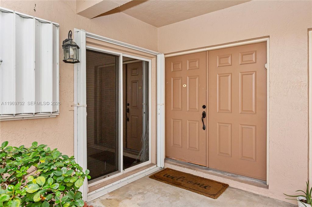 Photo of 9722 NW 23rd Ct, Pembroke Pines, FL 33024 (MLS # A11969702)