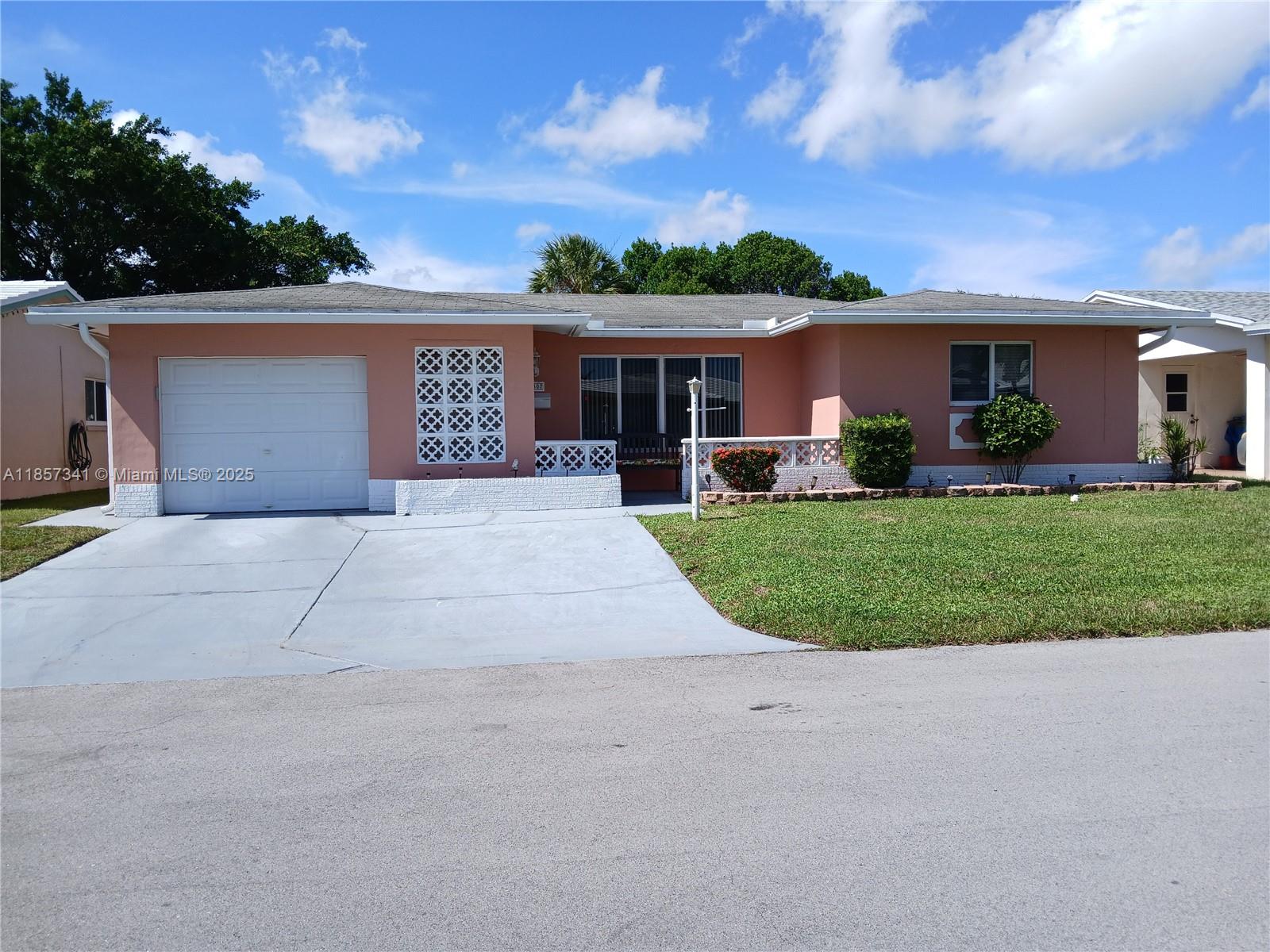 Beautiful 2/2 single-family home. Perfectly positioned to capture breathtaking park views from nearly every window in the family room. As you enter this move-in-ready home, you'll be greeted by natural light, tiled with laminate floors in bedrooms. This Westchester model floor plan flows seamlessly from the living room to your florida room, complete with breakfast bar seating area.
Perfect for the discerning 55+ buyers seeking an active lifestyle, this exceptional residence combines functionality with quite living. Additional highlights include a dedicated laundry room, utility space, and single-car garage. Residents will enjoy proximity to local shops and beach access, creating the ultimate Florida lifestyle experience. Don't miss this rare opportunity to own a home in Mainlands 3.