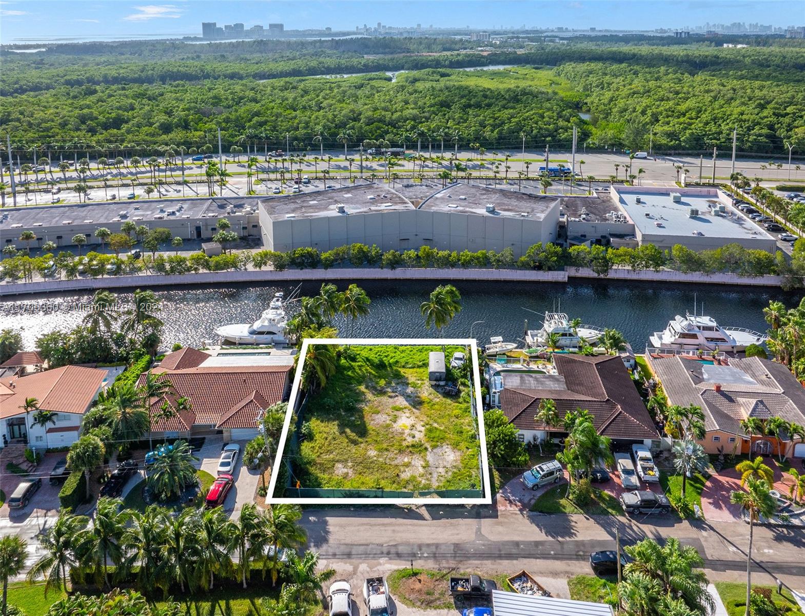 Build your dream mansion on this prime waterfront property in Eastern Shores, offering 85 feet of water frontage and direct ocean access with no fixed bridges. Spanning 9,229 sq ft, this property comes with fully approved plans by the award-winning SDH Studio, allowing you to create a modern masterpiece with ease. Perfectly situated minutes from the beach and surrounded by the luxury of Aventura, Sunny Isles, and Bal Harbour, this is a rare opportunity to craft your vision of South Florida waterfront living.