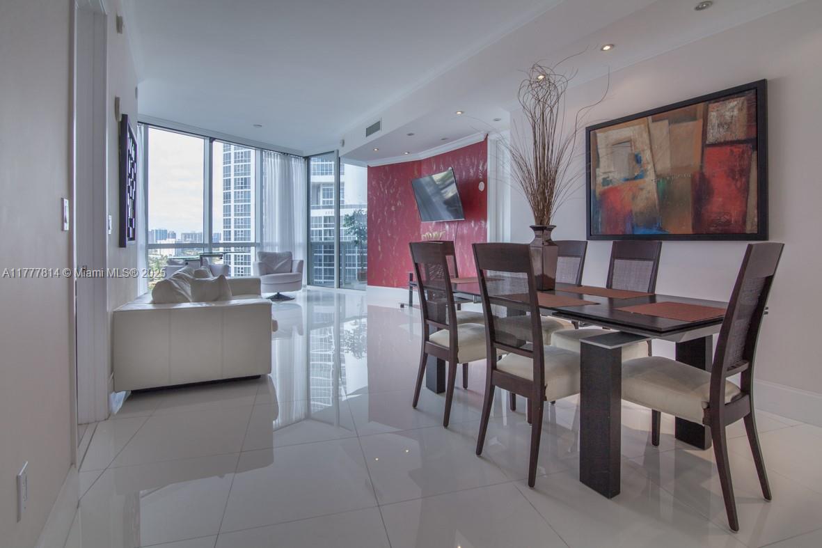 Luxurious oceanfront building offering a one-of-a-kind vacation home with amazing views of the city, Intracoastal, and partial ocean. This 2-bed, 2-bath residence features floor-to-ceiling windows, an expansive terrace with stunning city views at night and lovely ocean views during the day, porcelain floors, parquet, and custom closets in all rooms. Trump Palace provides a prime oceanfront location, full beach and pool services, a spa, state-of-the-art fitness center, activity classes, jacuzzi, tennis court, and full access to Trump International Hotel. Enjoy restaurant service and valet. Make your vacation great again!