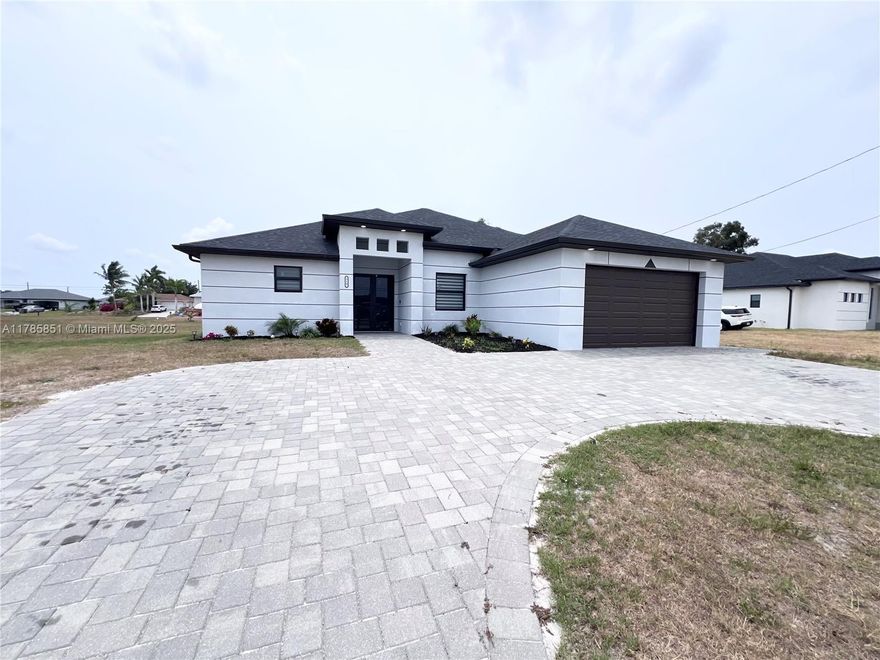 Brand new 4-bedroom, 2-bath modern home on an oversized 0.34-acre lot in a highly desirable location! Open-concept floor plan with an elegant kitchen featuring quartz countertops and modern finishes. Impact-resistant doors and windows, City Utilities!!!, and plenty of backyard space for outdoor living or a future pool. Conveniently located near top schools, shopping, and other amenities. 100% financing available — perfect for families. Move-in ready!