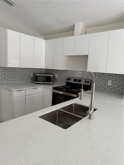 Photo of 12253 SW 18th Ter, Miami, FL 33175 (MLS # A11880596)