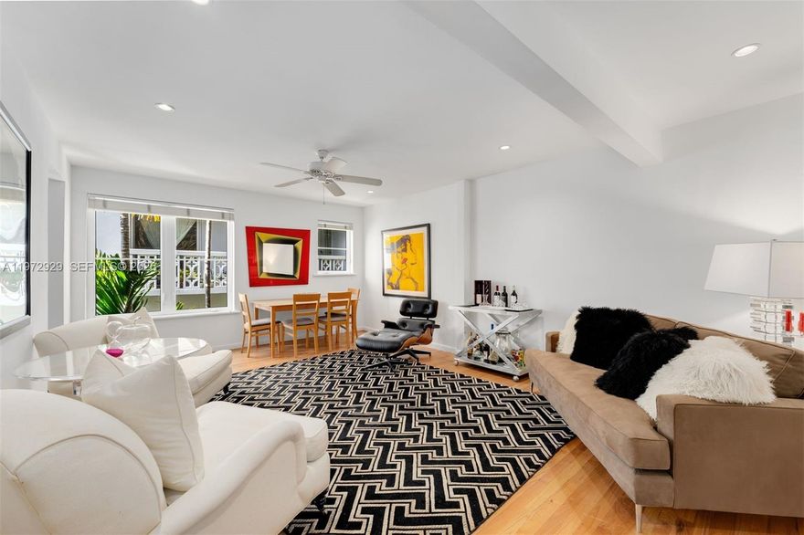 Experience timeless South Beach charm at The Coconut, an iconic Art Deco building. This premium top-floor corner unit offers exceptional natural light and privacy within an intimate eight-unit building. The spacious two-bedroom, two-bathroom layout blends historic character with modern comfort, featuring beautifully refinished wood floors, hurricane-impact sound proof windows, and central A/C throughout. The open living and dining areas flow effortlessly, while both bedrooms are generously sized with abundant closet space. Tastefully updated bathrooms showcase elegant marble tile on the floors and walls, adding a classic touch. Perfectly positioned on tree-lined Meridian Avenue, you’re just moments from the beach, Flamingo Park, Lincoln Road, world-class dining, and vibrant nightlife — all while enjoying the tranquility of a quiet residential setting. A comparable first-floor unit in the building sold for $450,000 just two months ago, making this top-floor corner opportunity especially compelling at its current price. Building recertification nearing completion per condo management. Move-in ready and easy to show — schedule your private tour today.