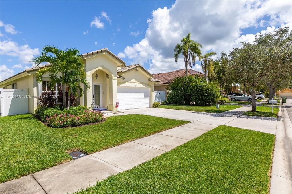 Photo of 445 SW 205th Ave, Pembroke Pines, FL 33029 (MLS # A11856423)