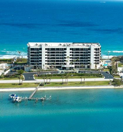 Meticulously maintained 3Br/3Ba unit, newly renovated 5th floor unit offering breathtaking blue Atlantic & Turquoise Intracoastal waterway views. Enjoy amazing sunrises & breathtaking sunsets.
Interior features include wood flooring throughout, impact sliding doors, new storm shutters, electric (remote) window blinds and electric window screens. Additional features include a water filtration system, custom wine bar and state of the art media room w/customized control for stereo, lighting, television and temperature. Office features include murphy bed, built in shelves and Murphy desk. Custom wall unit w/built in shelves in middle bedroom. Designer wallpaper throughout. New
carpeting in Master bedroom, cedar lined wall in closet in master. See additional remarks...