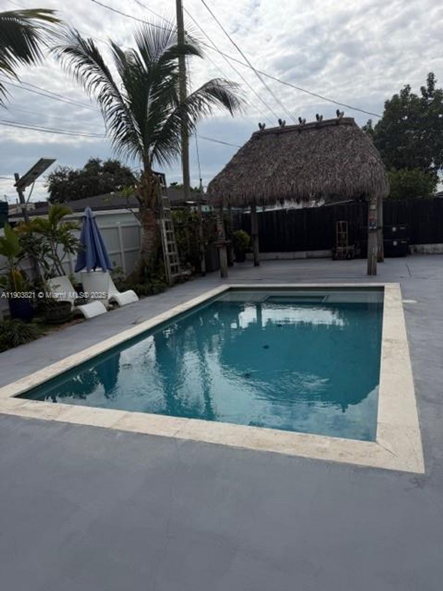 One of a kind in the area  3/2 with POOL and TIKI Prime location. walking distance to Amelia Earheart Park
Spacious, Roof from 2012,  Pool 2018, Central AC 2023, Tiki 2013, Elevated base concrete slab, accordion hurricane Shutters.  Enjoy Tropical lifestyle living.  Ample space for Boat, RV or multiple cars. fenced, storage shed in back yard.  Property is well maintained ready for a new family to enjoy.  NO Homeowner Association.
Appointment required. Contact listing agent today to see this property