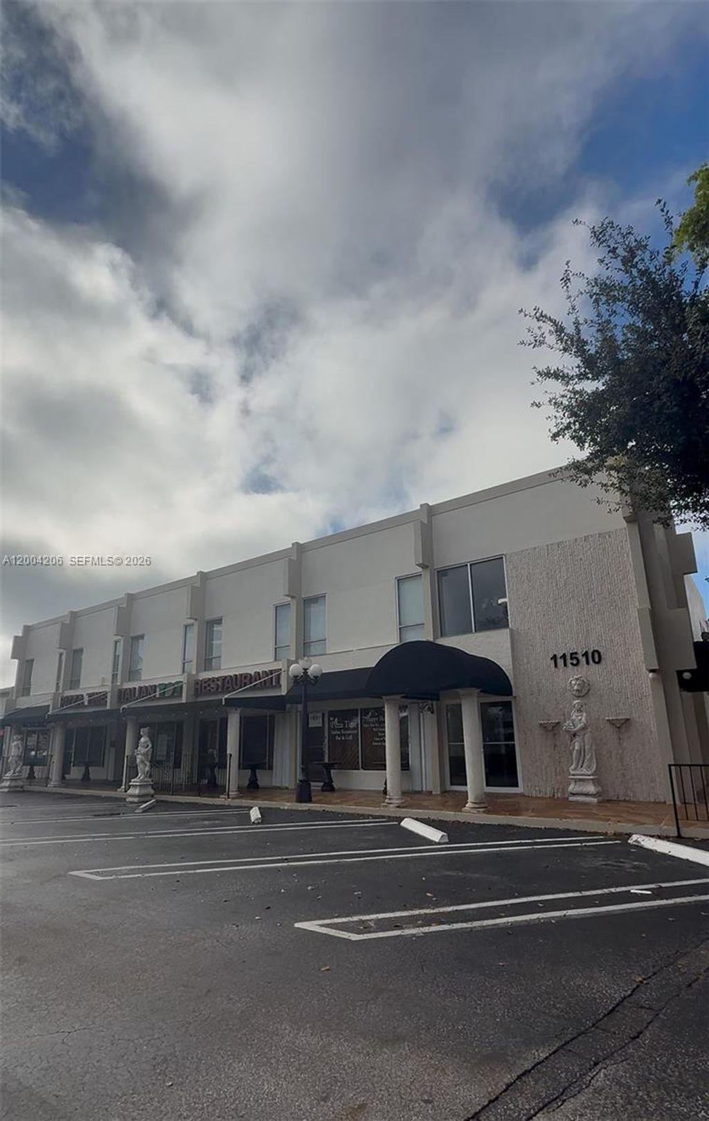 Photo of 11504 W Sample Rd #6, Coral Springs, FL 33065 (MLS # A12004206)