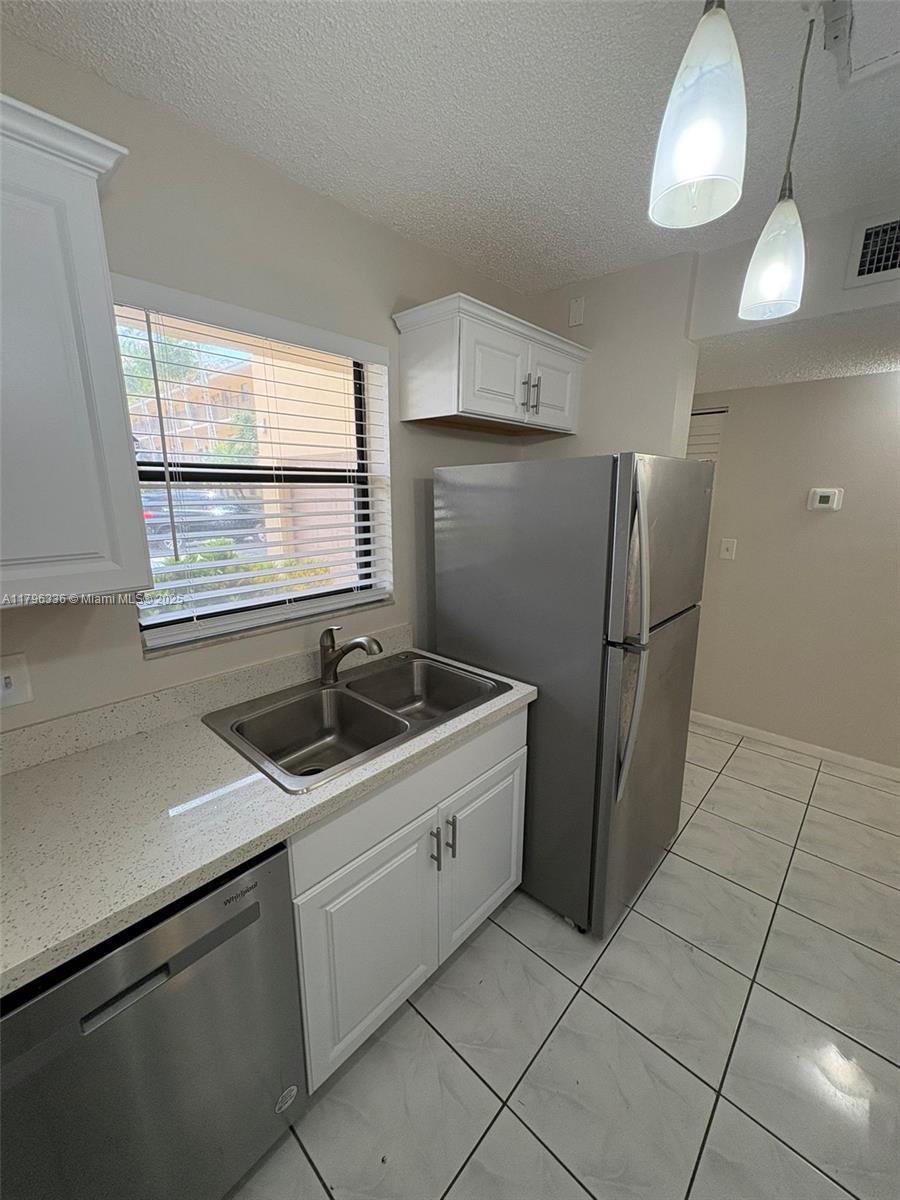 WATERS EDGE OF CORAL SPRI - Residential