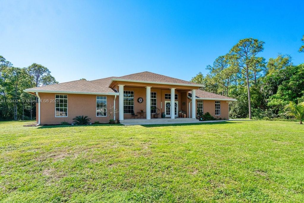 Photo of 13350 56th Pl N, Royal Palm Beach, FL 33411 (MLS # A11534321)