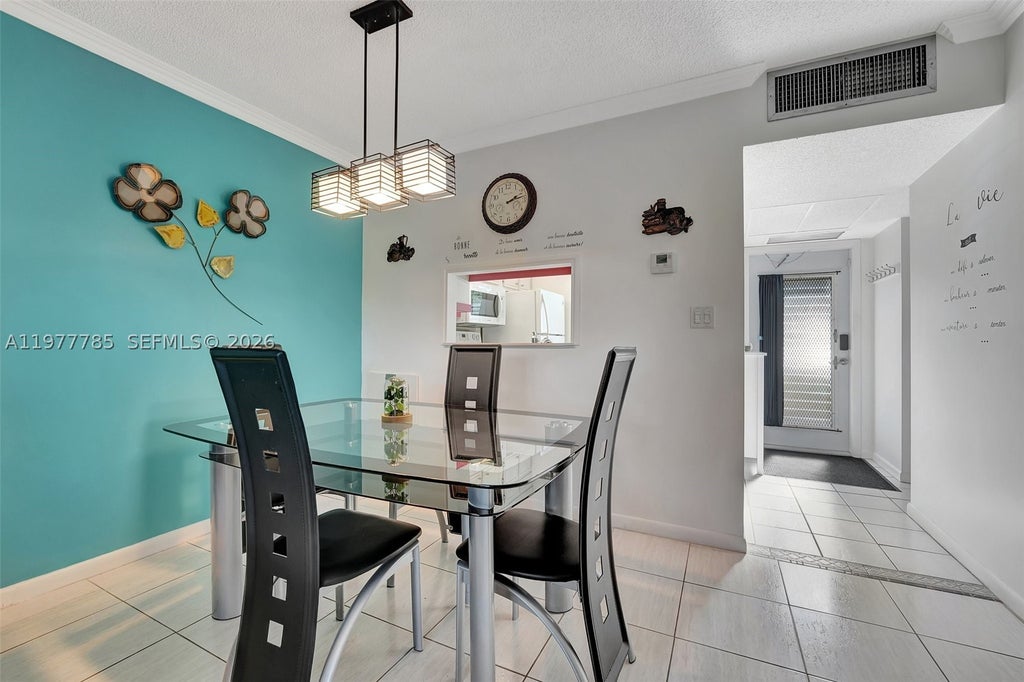Photo of 5003 NW 35th St #408, Lauderdale Lakes, FL 33319 (MLS # A11977785)