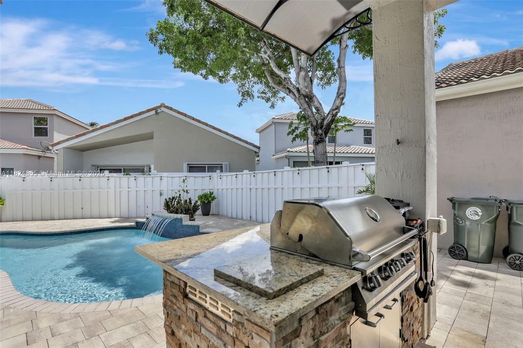 Photo of 3846 NW 62nd Ct, Coconut Creek, FL 33073 (MLS # A11824855)