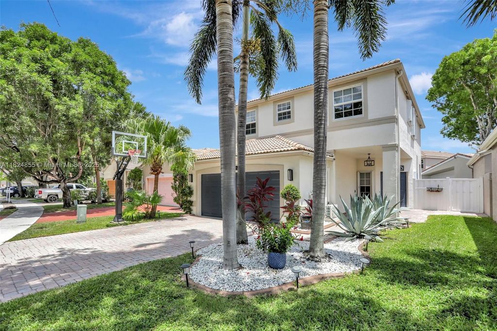 Photo of 3846 NW 62nd Ct, Coconut Creek, FL 33073 (MLS # A11824855)