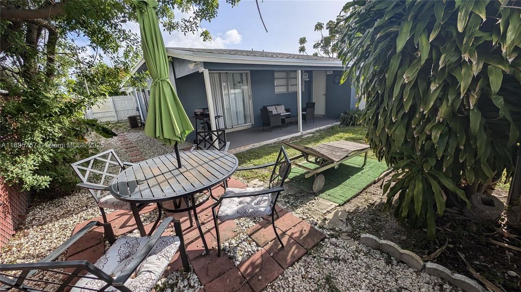 Photo of 460 NE 45th St #2, Oakland Park, FL 33334 (MLS # A11895757)