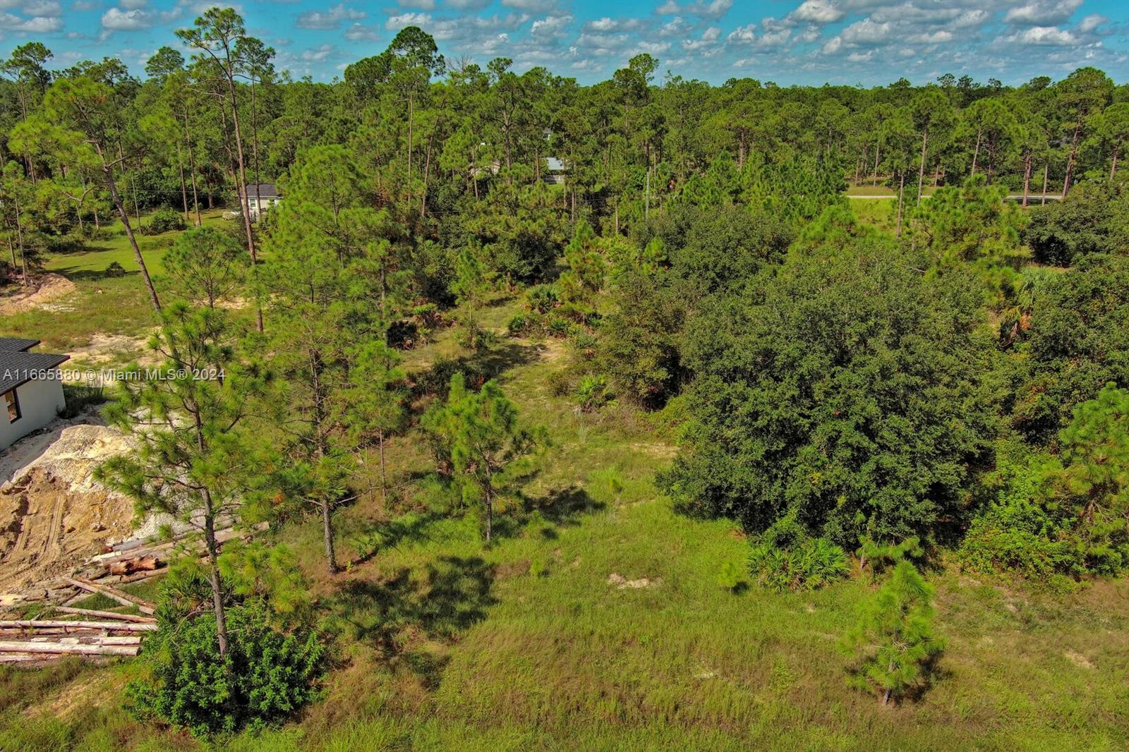 Exclusively listed by Sunland Real Estate: This prime 0.50-acre residential lot, centrally located in Lehigh Acres, is ready for development. Situated in a high and dry outside any flood zone, it offers a peaceful and secure setting for your new build. Close to major road Joel Blvd. Lehigh Acres is a rapidly expanding community, known for its affordable land and close proximity to Fort Myers. With abundant recreational opportunities, including parks, golf courses, and nature preserves, this area is ideal for residential development or investment, making it a prime spot for growth and future potential.