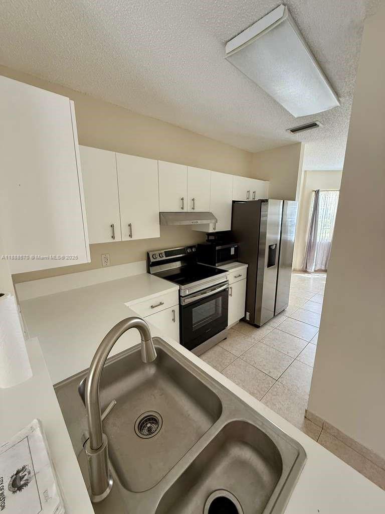 EMERALD COURTS - OPAL CRE - Residential Lease