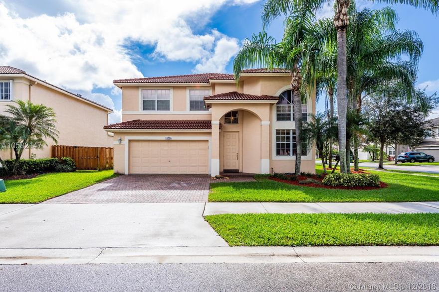 THIS IS A FANTASTIC OPPORTUNITY TO OWN A METICULOUS, BEAUTIFUL AND IMMACULATELY MAINTAINED HOME IN PRESTIGIOUS "EMERALD ESTATES" IN WESTON. THIS MOVE-IN READY, CORNER LOT, 4BEDS/3BATHS HOUSE FEATURES A RENOVATED KITCHEN WITH ALL GREEN ENERGY APPLIANCES, TILE FLOORS THROUGHOUT THE HOUSE, EVEN THE STAIRS!. SPACIOUS, INVITING LIVING AND FAMILY ROOM ON FIRST FLOOR. MASTER BEDROOM IS LOCATED ON SECOND FLOOR TOGETHER WITH A CONVENIENT LOFT. ONE FULL BEDROOM AND BATH DOWNSTAIRS FOR FAMILY AND/OR GUESTS. THIS PROPERTY IS IN A HIGHLY DESIRABLE LOCATION, CLOSE TO EVERYTHING YOU MAY NEED: SHOPPING, DINING, "A" SCHOOLS, OFFICES, AND A COUPLE OF MINUTES AWAY FROM I-75 and I-595. CALL ME TO SCHEDULE AN APPOINTMENT.