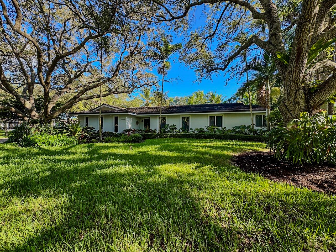 Nestled in Palmetto Bay’s sought-after Old Cutler South neighborhood, this 4/2 home sits on a 18,774 sq. ft. corner lot with opportunity to build addition to home surrounded by lush oaks, coconut palms, and tropical landscaping. The property offers privacy with no through-traffic thanks to bordering canals, while being just a short stroll to the Deering Estate and People’s Dock. Boaters will love the 15-minute drive to Black Point or Matheson Hammock marinas, and families will appreciate nearby “A” rated schools. Updates include flat tile roof, PVC plumbing (no cast iron), exterior walls restucco and PGT impact windows/doors, all completed in 2018. Resurfaced pool, natural shell stone deck, and updated Jandy equipment completed mid-2023.
