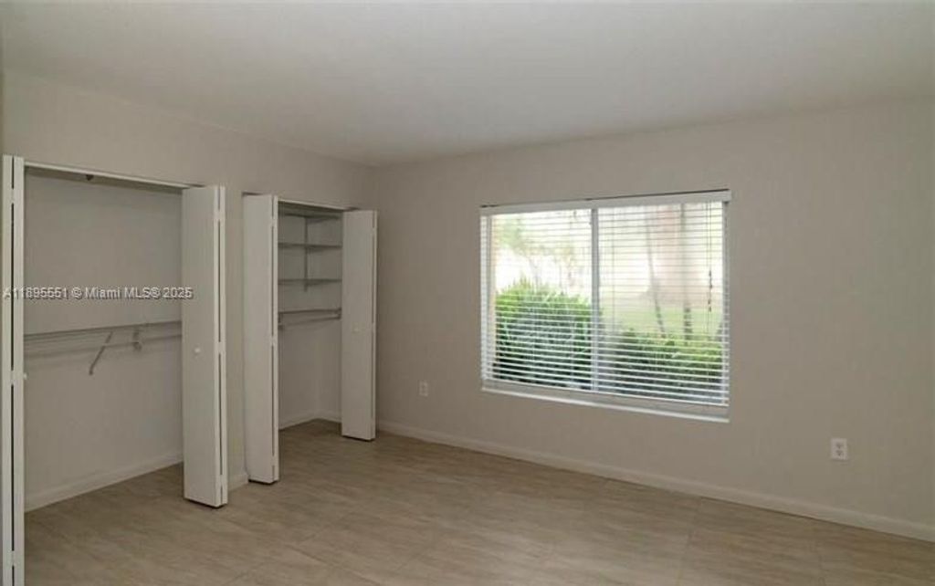 Photo of 2321 NW 33rd St #203, Oakland Park, FL 33309 (MLS # A11895551)