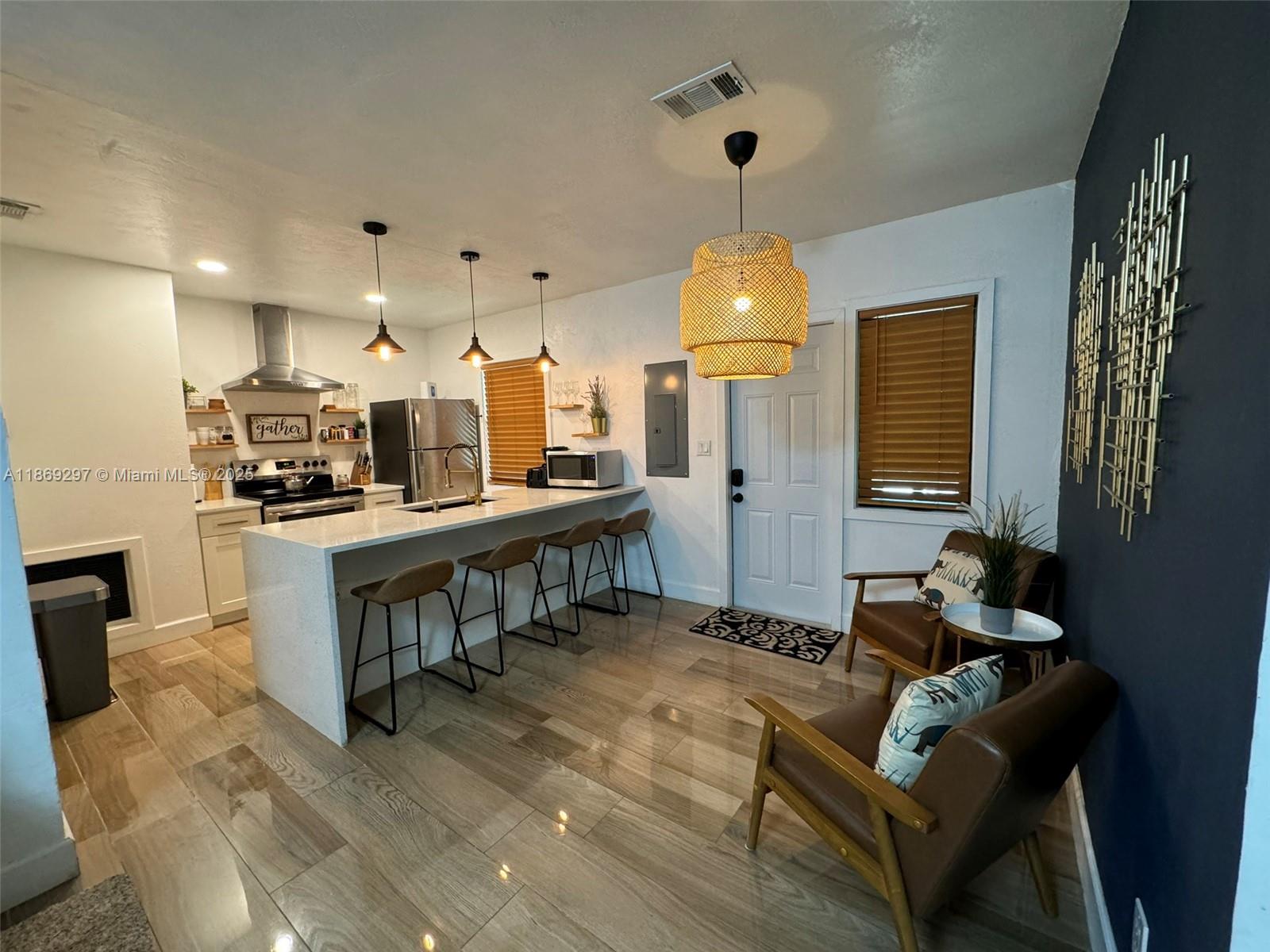 Beautifully renovated home, move-in ready condition. Features an open-concept layout with wood-look tile flooring, contemporary white kitchen with quartz countertops and stainless appliances, plus a large island perfect for entertaining. The property includes a spacious backyard. Prime Ft. Lauderdale location- Minutes from Las Olas Blvd., Ft. Lauderdale Beach, downtown, and Ft. Lauderdale-Hollywood International Airport with easy I-95 access. Close to Museum of Discovery and Science, Broward Health Medical Center, shopping centers, and multiple parks. Perfect for commuters and beach lovers alike. Located on a RD-15 zoning (allows for duplex or two single-family homes) excellent investment opportunity for builders and developers. Perfect for owner-occupants or investors looking to build.