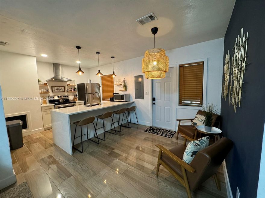 Beautifully renovated home, move-in ready condition. Features an open-concept layout with wood-look tile flooring, contemporary white kitchen with quartz countertops and stainless appliances, plus a large island perfect for entertaining. The property includes a spacious backyard. Prime Ft. Lauderdale location- Minutes from Las Olas Blvd., Ft. Lauderdale Beach, downtown, and Ft. Lauderdale-Hollywood International Airport with easy I-95 access. Close to Museum of Discovery and Science, Broward Health Medical Center, shopping centers, and multiple parks. Perfect for commuters and beach lovers alike. Located on a RD-15 zoning (allows for duplex or two single-family homes) excellent investment opportunity for builders and developers. Perfect for owner-occupants or investors looking to build.