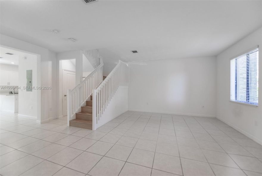 Discover modern living in this beautifully designed 3-bedroom, 3.5-bath townhome featuring an open layout and stylish finishes throughout. The main level offers sleek tile flooring, while the wood staircase and second-floor bedrooms add warmth and character. The spacious primary suite includes a large walk-in closet while one of the extra bedrooms features a private balcony overlooking the community. Enjoy the convenience of an in-unit washer and dryer and generous storage throughout. The turfed outdoor patio creates a low-maintenance space perfect for relaxing or entertaining. Located in a desirable community offering a sparkling pool, jacuzzi, and children’s play area, this home blends comfort, style, and amenities in one exceptional package.