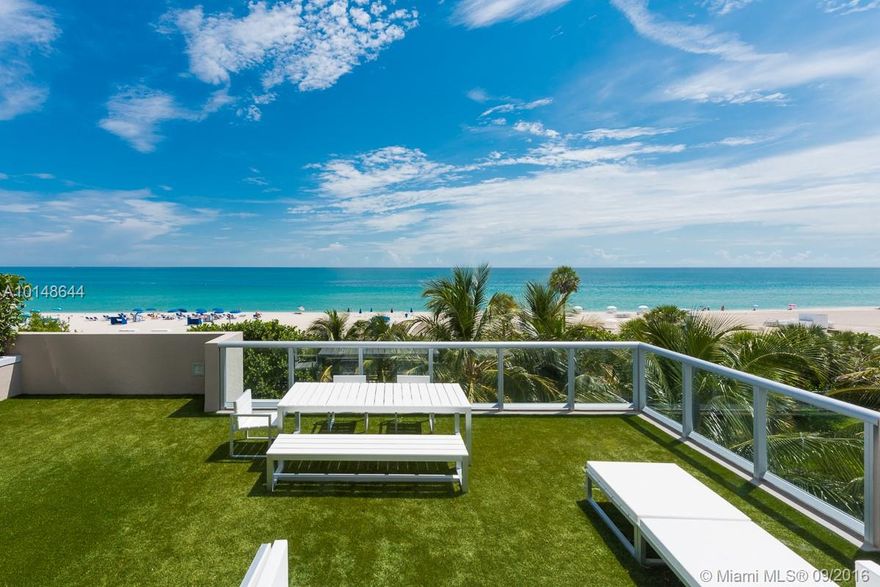 Beautiful 4 story beachfront town home with private elevator and 2 car garage. Ocean views from every room & private roof-top terrace. Enjoy the best of both worlds, the privacy of a home but with the amenities of a condo building  which include beach and towel service, 24 hour free valet, concierge, security, infinity pool, gym, theater room and club room.