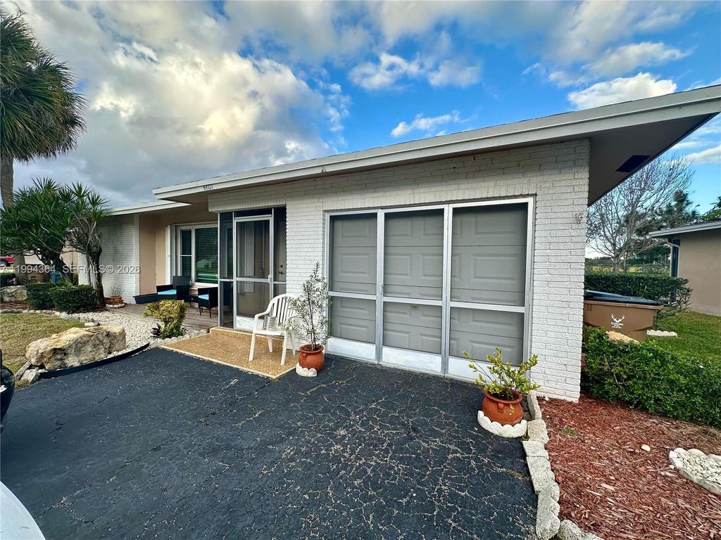 Photo of 4801 NW 13th Ave, Deerfield Beach, FL 33064 (MLS # A11994364)