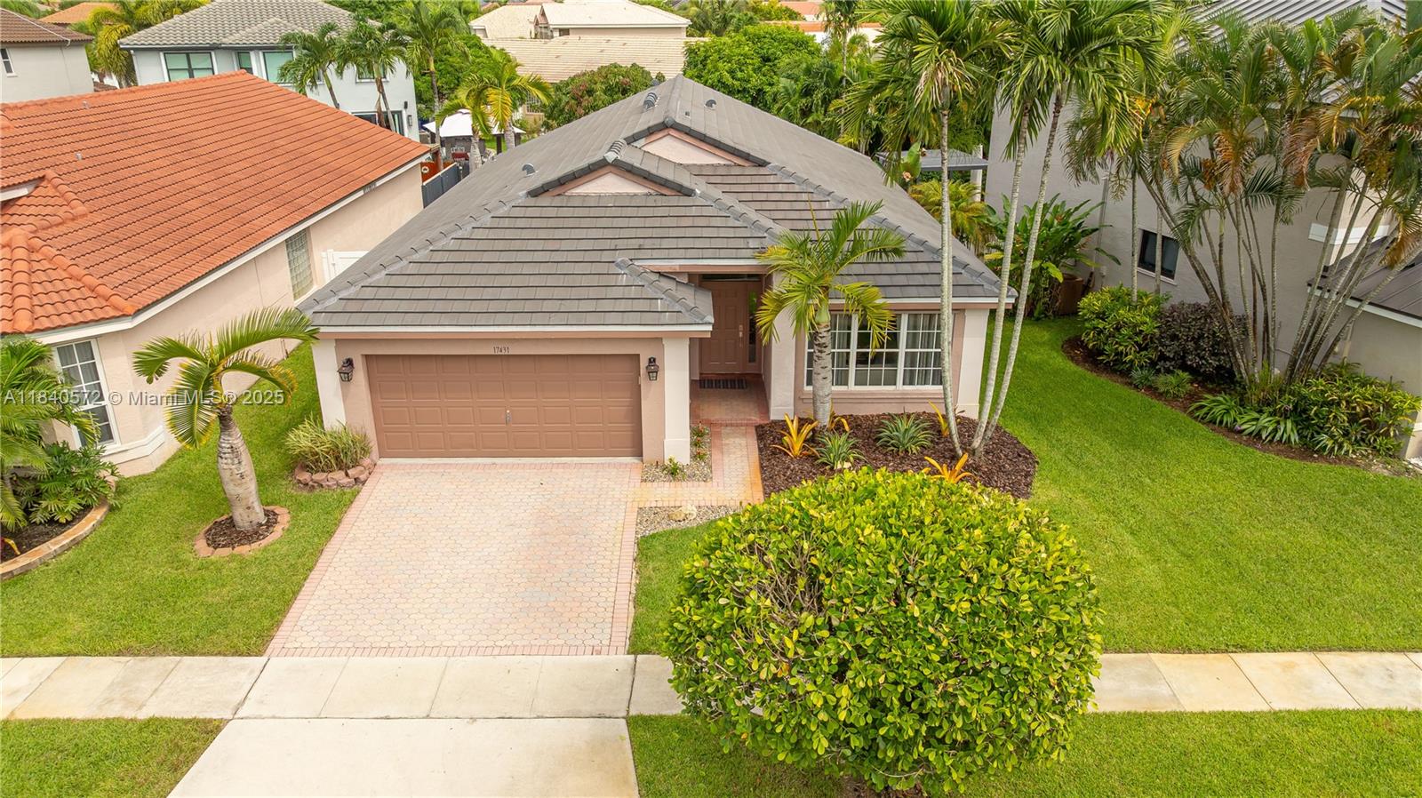 Welcome to this beautiful 3-bedroom, 2-bath single-story home offering 1,731 square feet of comfortable and functional living space. The remodeled kitchen features ample cabinetry and brand-new stainless steel appliances, perfect for everyday cooking and entertaining. The spacious family room flows seamlessly to a screened patio and fully fenced backyard—ideal for relaxing, hosting guests, or letting pets play safely. The primary suite boasts a stunning, updated bathroom, adding a touch of luxury to your daily routine. Recent improvements include a new water heater, a 2018 AC unit, and a roof that’s just 3 years old, providing added peace of mind. Conveniently located near schools, parks, shopping, and major highways. This Miramar home is a true gem—schedule your showing today!
