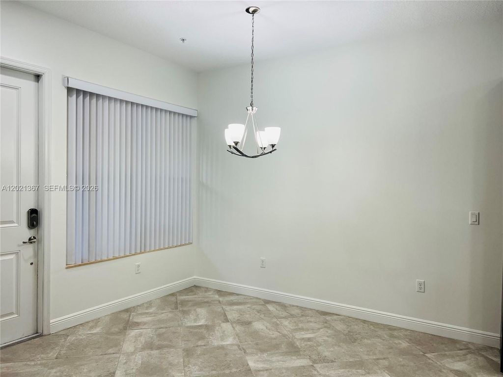Photo of 12432 NW 18th Ct, Pembroke Pines, FL 33028 (MLS # A12021367)