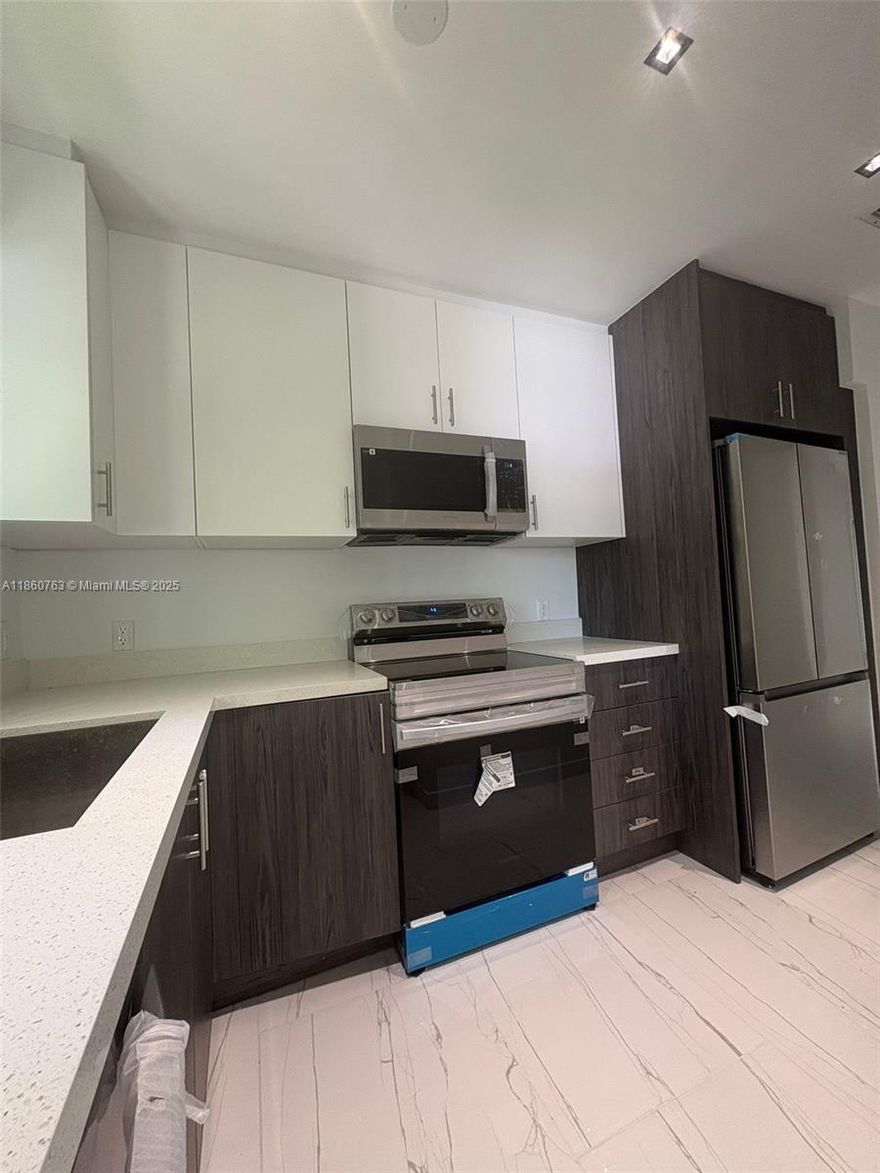 Fully renovated 2-bedroom, 1-bath residence in the heart of Bay Harbor Islands! This bright and spacious unit features brand new stainless steel appliances, washer & dryer inside the unit, custom-made closets, and elegant porcelain floors throughout. Enjoy the convenience of 1 assigned parking space in a boutique building with only a few units, offering privacy and a quiet lifestyle. Prime location just minutes from Bal Harbour Shops, the beach, Surfside, parks, A-rated schools, and great dining options. A perfect blend of comfort, style, and convenience — ready to move in!