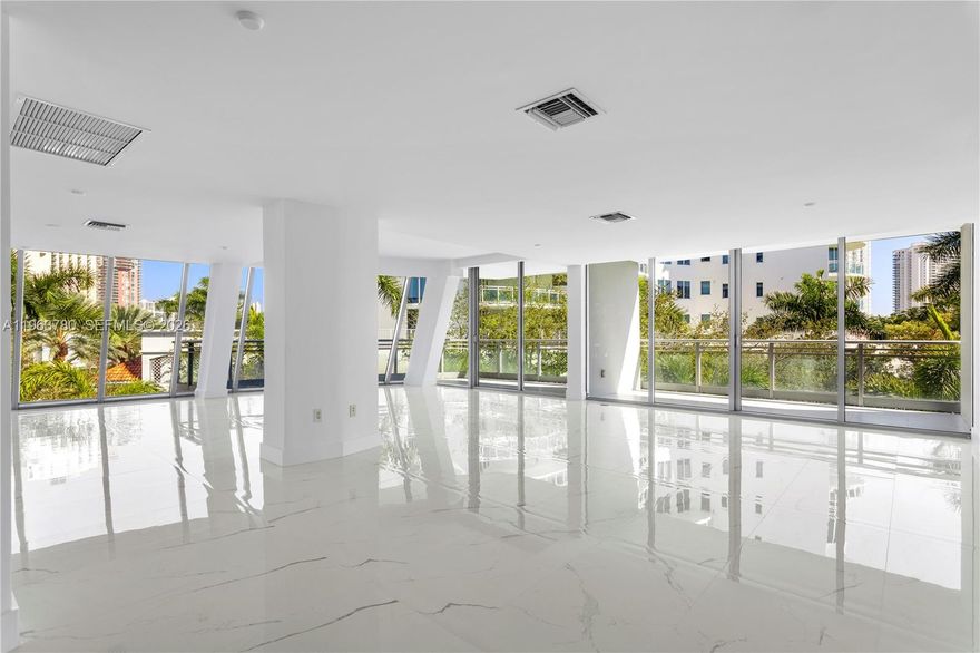 Gorgeous 4-bedroom/5.5-bathroom residence with 3,381 sq ft of interior living space plus expansive terraces. A 2-story unit with a convenient suite downstairs. Freshly painted and upgraded with new modern flooring and custom built-in closets. IMPECCABLE CONDITION — vacant and move-in ready!  Located in the heart of Aventura in this newer waterfront building designed by renowned architect Carlos Ott, offering breathtaking Intracoastal views. Just minutes from Aventura Mall, fine dining, beaches, top-rated schools, and houses of worship.  For BOAT LOVERS, THERE ARE BOAT SLIPS LOCATED IN THE COMPLEX, AND A MARINA, just a few steps away.  Enjoy the best of South Florida living with RESORT-STYLE AMENITIES, including a waterfront infinity pool, fitness center, 2 tennis courts, spa/sauna, movie theater, valet, 24-hour concierge/security, and a scenic boardwalk surrounding the peninsula.  Includes 2 parking spaces and 1 storage unit. Internet & Cable included in HOA. ** RARE OPPORTUNITY OFFERING EXCEPTIONAL VALUE! **