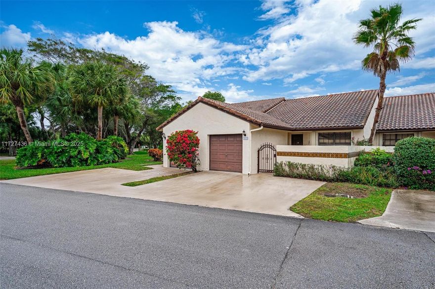 Beautiful Villa completely remodel in a gated community of Windwood, East Boca Raton. Renovated kitchen with Marble countertops, stainless steel appliances includes new washer and dryer. Upgraded bathrooms, new vinyl flooring. Unit has accordion shutters. Screened in patio, front courtyard, beautiful backyard landscaping. Community amenities includes Basic Cable, BBQ and picnic areas, Dog park, racket all, tennis court 2 swimming pools and club house.  Less than 2 miles from beach,- I-95-Mizner Park-Restaurants-Town Center Mall-FAU & Lynn University-Top public schools