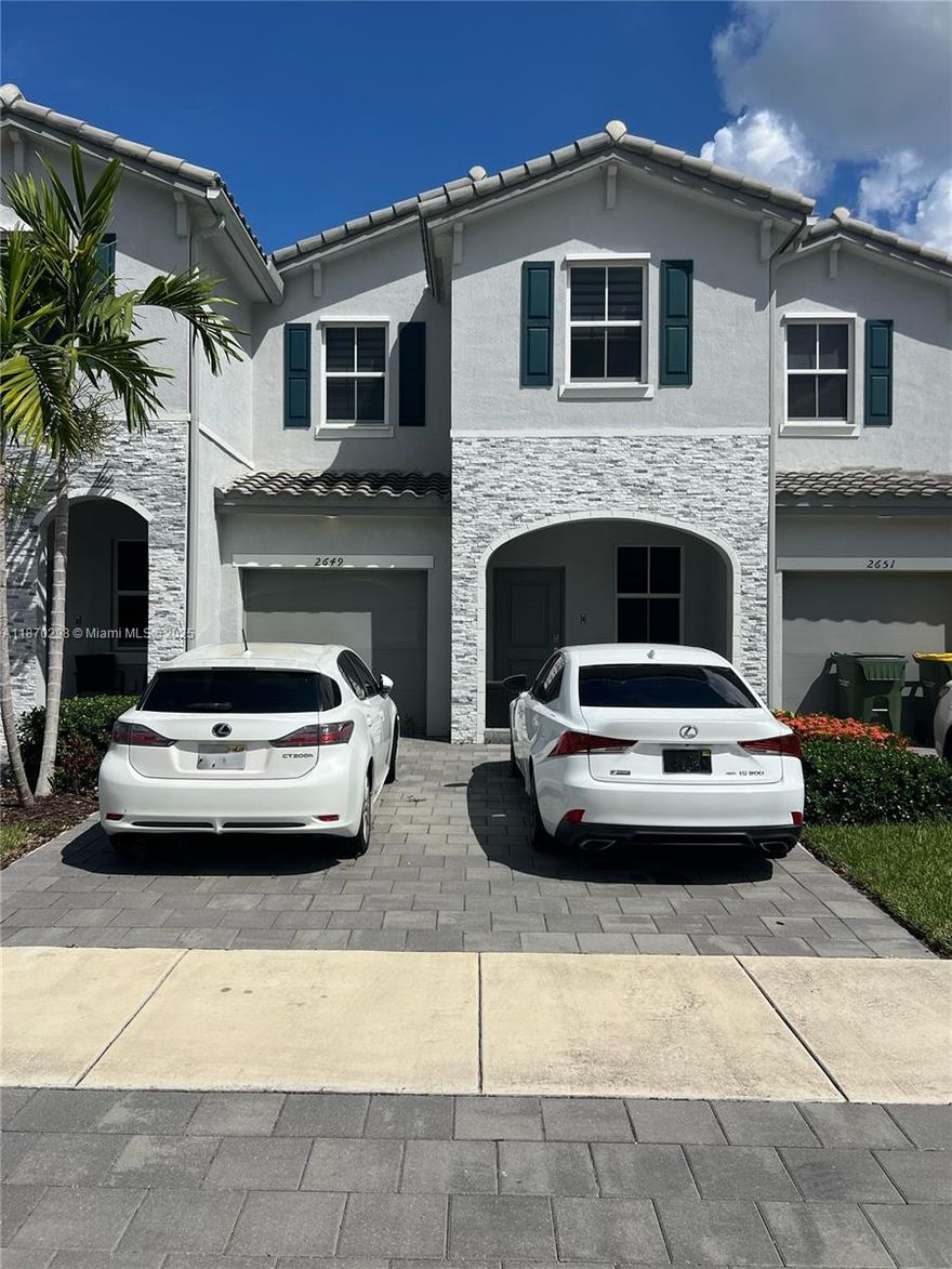 Modern Townhome in The Riviera Resort-Style Living in Homestead Step into resort-style living in this stunning 3 bedroom, 2.5 bath townhome located in a gated community. Built in 2021, this move-in ready home features two spacious living areas, a large island with seating for four, upgraded deep sink, designer backsplash, and sleek vinyl flooring upstairs. The bright, open layout includes a massive walk-in closet, spacious laundry room, and a luxurious master bath. Located in a gated community with a resort-style pool, gym, and low HOA. Direct access to major highways, shopping, and dining. Stylish, well-kept, and move-in ready. This home offers the perfect blend of comfort, design, and location.