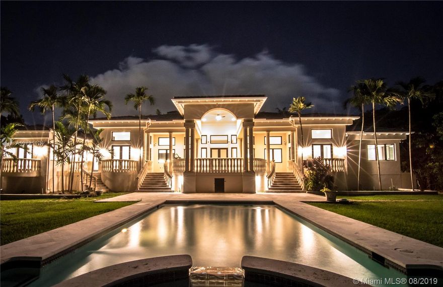 This unique and elegantly appointed 7,497 sq. ft. 6/7.5 custom home on an expansive 40,008 sq. ft. lot is situated in the neighborhood of Cocoplum in Coral Gables, one of Miami's most prestigious locations, surrounded by some of the best schools in the city.  It was completely remodeled in 2016 and features 22 ft. high ceilings throughout, designer gourmet kitchen with state of the art integrated Sub Zero refrigerator and Wolf stainless steel appliances, large breakfast area, formal dining room with a 45 ft. high ceiling, natural stone flooring, hurricane impact windows and doors throughout, new HVAC system, master suite with a seating area and ample his and hers walk in closets and bathrooms, impressive living room entrance with a working fireplace, large family room and more.