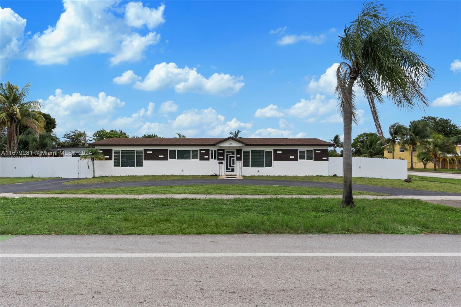 This is the house you has been looking for,,,,,Fully remodeled from the modern open Kitchen with S/S appliances and quartz countertops to the bathrooms you will find here a lot of space inside and outside with a corner lot to build your dream pool and additional space to park a bote or RV.